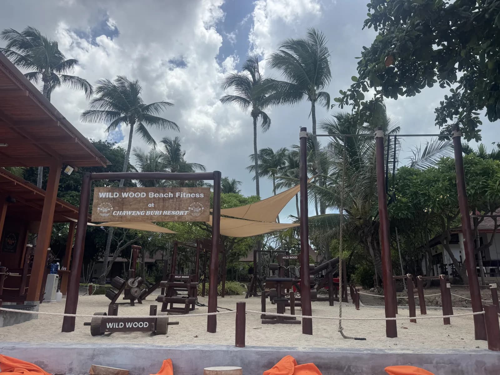 Wild Wood Beach Fitness sign on the beach at Chaweng Buri Resort, Ko Samui, Thailand